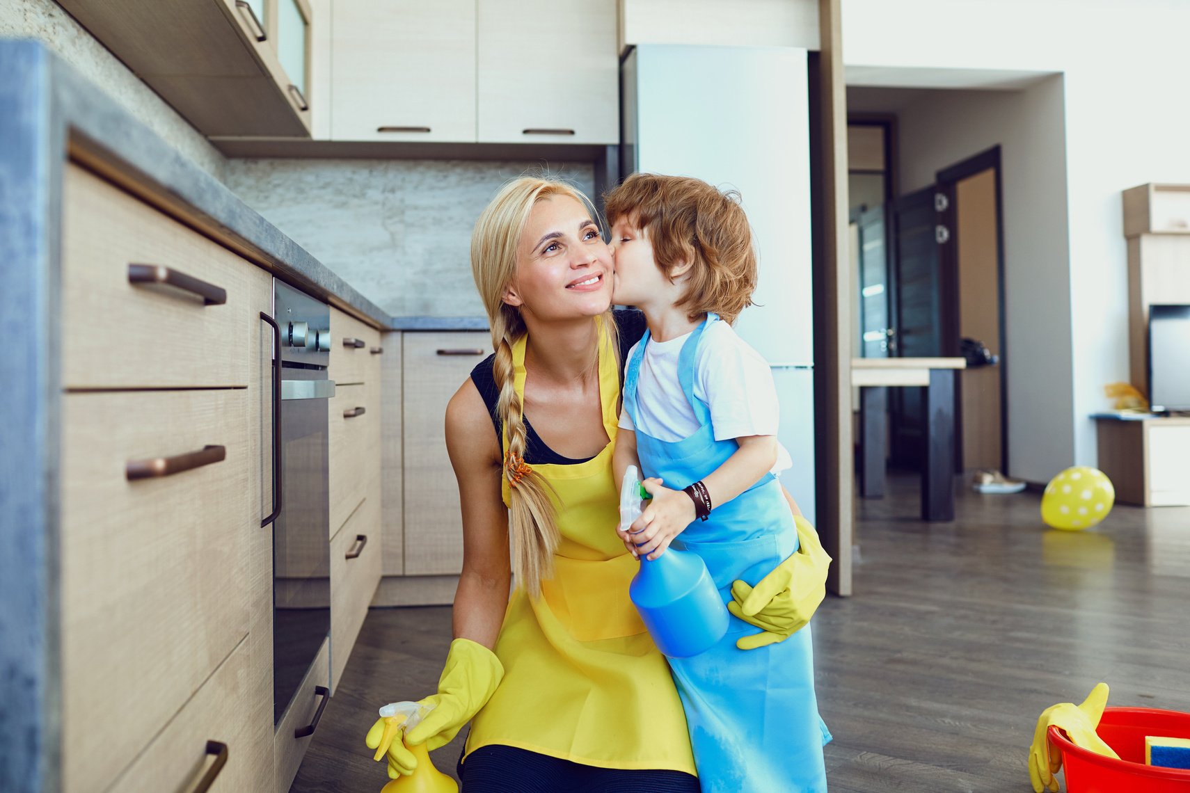 Mom and Child Cleaning the House